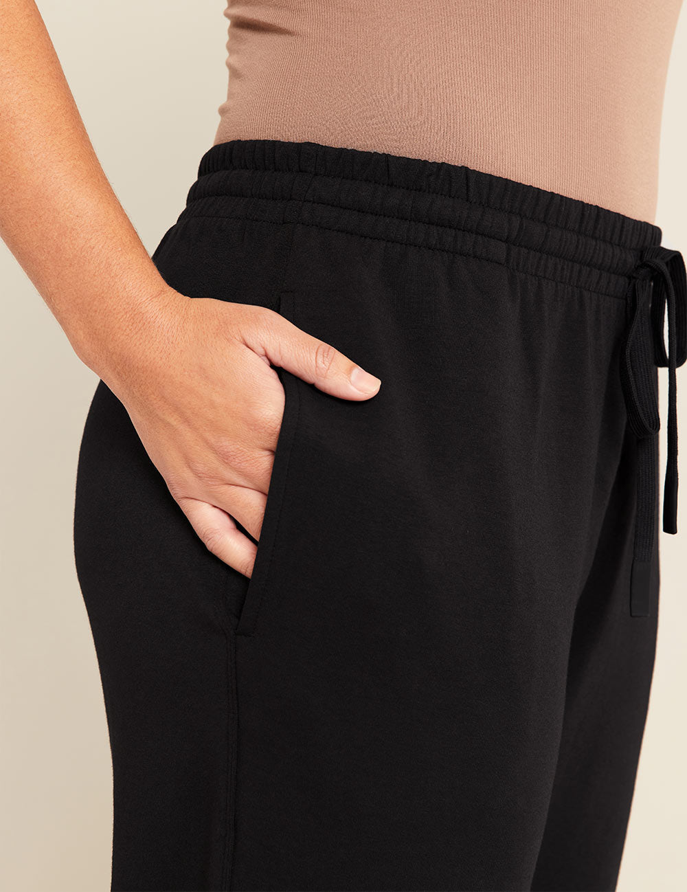 Gender-Neutral-Cuffed-Sweat-Pants-Black-Female-Detail.jpg